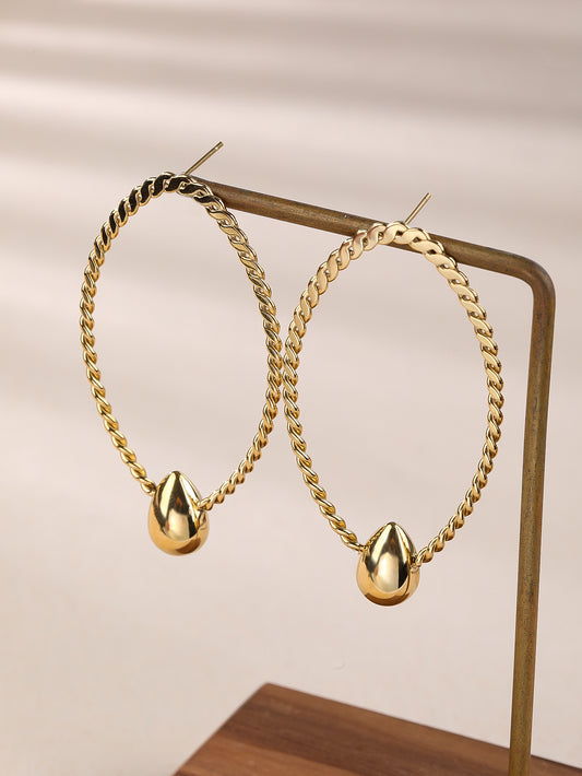 Sphere&Style Golden Dangle Oval Earrings